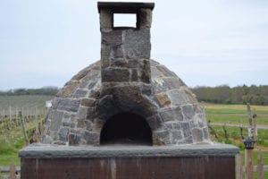 Palmer Vineyards now features an on-site brick oven for fresh pizzas made by Chef Anna Aracri. Photo by Alex Petroski