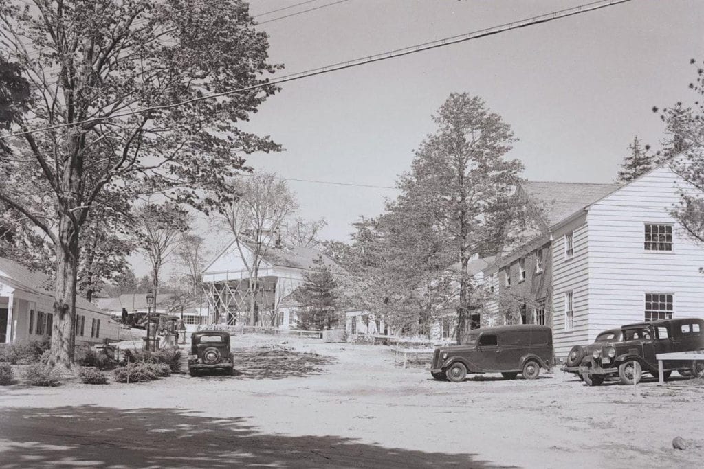 A photo captures construction underway at the Stony Brook Village Center in 1940. Photo from the WMHO