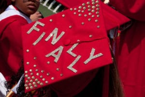 Students graduating from Stony Brook University this year decorated their caps. Photo by Greg Catalano