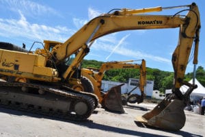 Heavy equipment is on display during the groundbreaking for the Shipyard apartments in Port Jefferson on June 14. Photo by Elana Glowatz