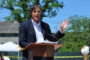 TRITEC's Bob Coughlan talks about the development's impact on Port Jefferson Village at the groundbreaking for the Shipyard apartments on June 14. Photo by Elana Glowatz
