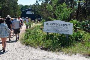 the tour approaches the Ernst Marine Conservation Center to hear about its history and to fill water bottles with spring water from the aquifer behind the building.