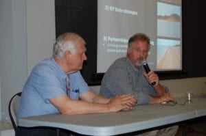 From left, Assemblyman Steve Englebright and naturalist John Turner discuss the fate of Plum Island with the audience. Photo by Heidi Sutton