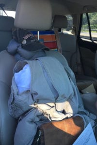 Candace Breen-Warren, piled clothing and topped it with a baseball hat, to resemble a person in an attempt to drive in the HOV lane of the Long Island Expressway. Photo from SCPD