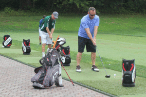 Golfers tee off in support of the Patriots. Photo by Kevin Redding