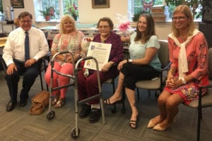 Beatrice Caravella, center, celebrates her 100th birthday with Brookhaven Town Supervisor Ed Romaine, Councilwoman Jane Bonner and other family and friends. Photo from Town of Brookhaven