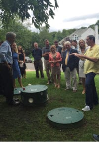 Elected officials and environmental advocates gathered at the home of Jim and Donna Minei, recipients of a Innovative and Alternative Onsite Wastewater Treatment Systems through the Suffolk County Septic Demonstration Pilot Program. Photo from Steve Bellone's office
