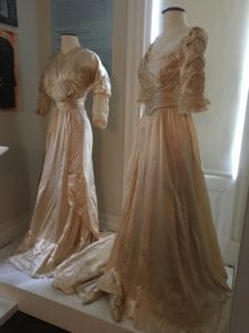 Two of the wedding dresses on display at the exhibit. Photo courtesy of Smithtown Historical Society