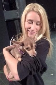 Brittany Lacey with the only four-legged member of the show, Taxi. Photo courtesy of Theatre Three