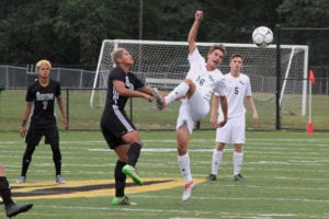 Anthony Cassano stops a pass a midfield. Photo by Desirée Keegan