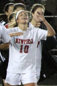 Kristen Prevosto celebrates her team's come-from-behind win. Photo by Desirée Keegan
