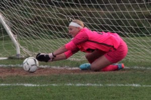 Emma Havrilla makes her first save in the shootout. Photo by Desirée Keegan
