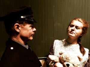 Officer Lockstock (Michael Bertolini) and street urchin Little Sally (Courtney Braun) in a scene from ‘Urinetown’, Photo courtesy of SCPA
