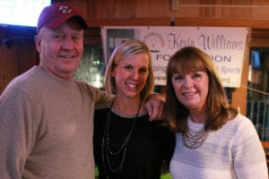 Mike Williams, his daughter Kelly and wife Patti host a toy drive in memory of son and brother Kevin. Photo by Kevin Redding