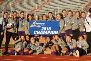 The Port Jefferson girls' soccer team topped Geneseo, 4-1, for the program's second consecutive state title. Photo by Andrew Wakefield