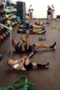Rylie Laber stretches with the Stony Brook University women’s soccer team. Photo from Mary Balint