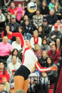 Smithtown East's Haley Anderson sends the ball back over. Photo by Bill Landon