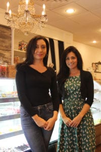 Gina Nisi and Angela Nisi-MacNeill are the co-owners of Carl’s Candies. The new candy shop replacing Harbor Trading on Main Street in Northport. Photo by Victoria Espinoza