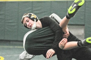 Tom Fitzsimons drops an opponent during practice. Photo by Bill Landon