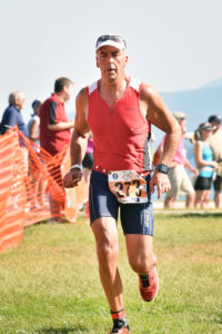 Above, William Van Nostrand completes a triathlon this past September in Lake George. Photo courtesy of William Van Nostrand